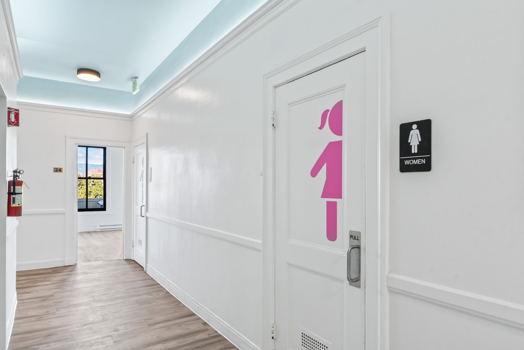 Bright hallway with skylight and natural light
